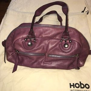 Hobo International purple leather handbag.